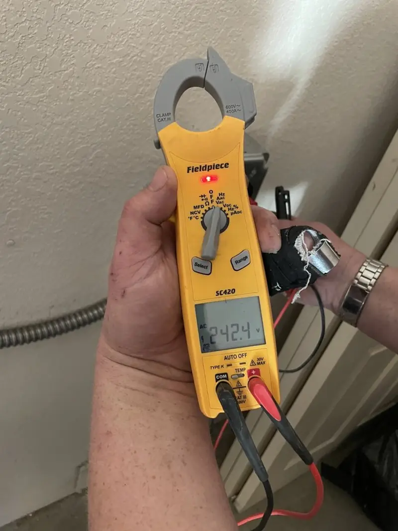 Voltage testing with clamp meter during Generator Installation in Redwood